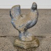 A Charming Concrete Chicken Umbrella Stand