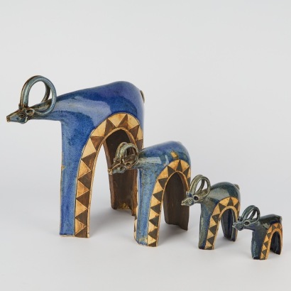 A Graduated Set of Four Vintage Pottery Wild Buffalo Figures