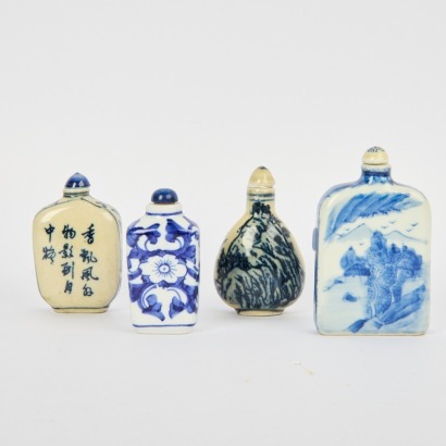 A Group of Four 20 Century Chinese Blue and White Snuff Bottles