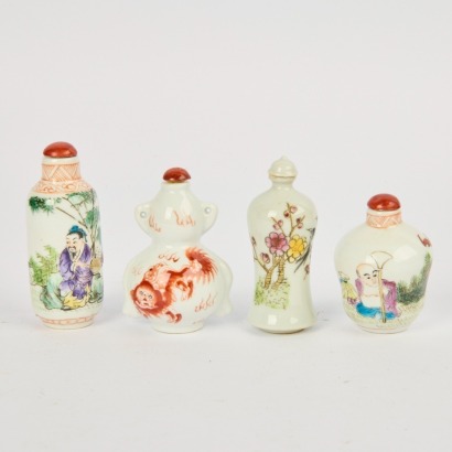 A Group of Four 20 Century Chinese Famille Rose Snuff Bottles
