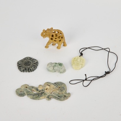 A Group of Five 20 Century Chinese Carved Jade Animal Plaques