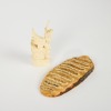 An Asian Carved Bone Ornament and an Elephant Tooth