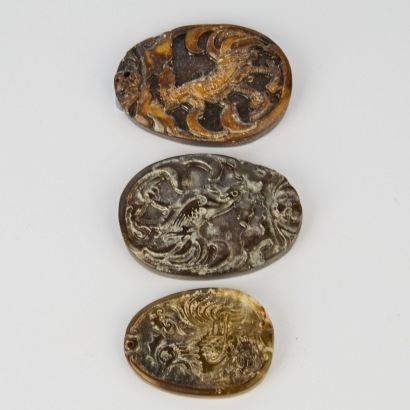 A Group of Three Chinese 20th Century Carved Jade 'Rooster' Pendants