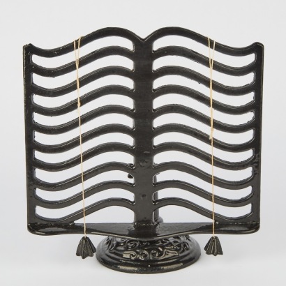 A Vintage Enameled Cast Iron Book Stand