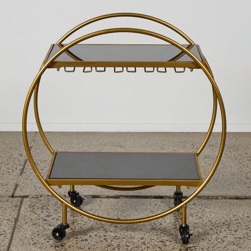 A Bar Cart with Black Glass Shelves in Gold Finish