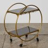 A Bar Cart with Black Glass Shelves in Gold Finish - 2