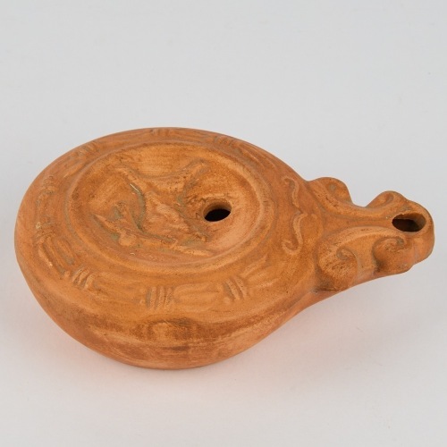 A Roman-Style Terracotta Oil Lamp