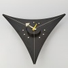 A Vitra Triangle Wall Clock by George Nelson