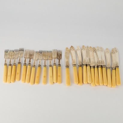 A Collection of Twenty Four Silver Knives and Forks by Joseph Gloster 1.118kg