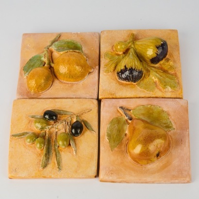 A Set of Four Terracotta Kitchen Wall Tiles
