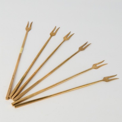 A set of six Mid-century Brass Two-Prong Forks