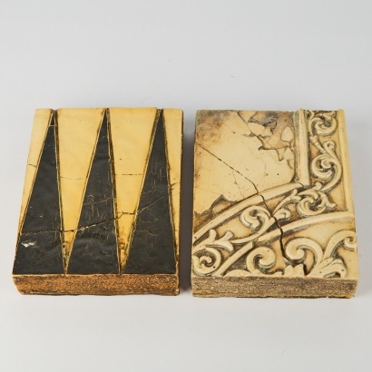A pair of Sid Dickens Tiles