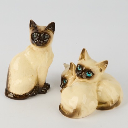 A Pair of Royal Doultion Siamese Cats