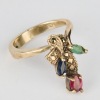 A Stg. Silver Ring with Emerald, Ruby & Blue Sapphire