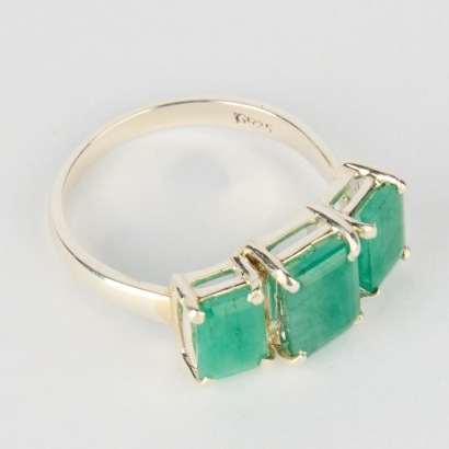 A Stg. Silver Ring with Emeralds