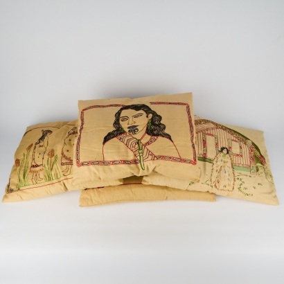 A Set of Four Maori Embroidered Pillows