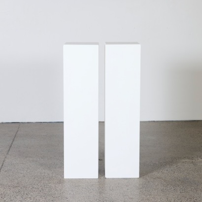 A Pair of Tall White Art Gallery Plinths