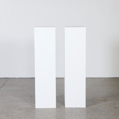 A Pair of Tall White Art Gallery Plinths