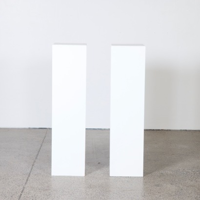 A Pair of Tall White Art Gallery Plinths