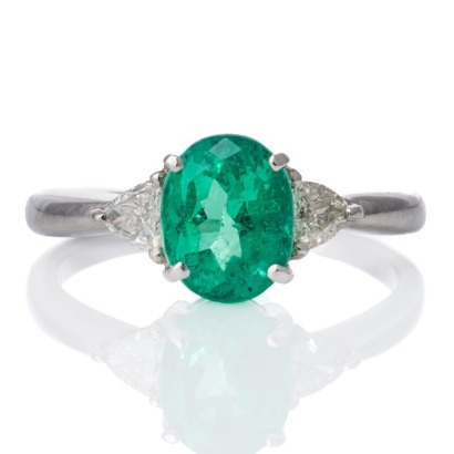 Platinum, 2.35ct Emerald / 0.20ct Diamond Three-Stone Ring
