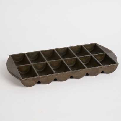 An Antique Cast Iron Jem Tray