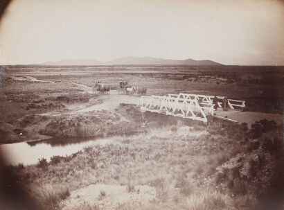 UNKNOWN PHOTOGRAPHER Horse drawn Carriages and Bridge