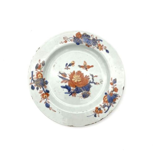 A Chinese Qing Dynasty Yongzheng Period Blue and White Iron Red Coloured Saucer
