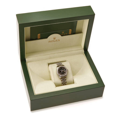 A Lady's stainless steel and 18ct white gold Datejust, Rolex, circa 2006. Automatic. 26mm. Ref. 179384. Cal. 2235. Serial number DE875126. Black dial with diamond markers, centre sweep seconds, date aperture at 3 o'clock. Diamond bezel. Jubilee bracelet. 