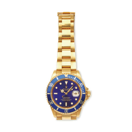 A Gentleman's gold Oyster Perpetual Submariner wristwatch, Rolex, circa 1991. Ref. 16618. Cal. 3135. Serial number N134184. Violet sunburst dial with applied luminous dots, uni-directional bezel, centre sweep seconds, date aperture at 3 o'clock. Case, dia