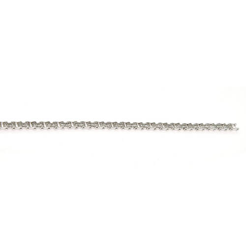 A diamond chain style bracelet, twenty articulating links comprising of one hundred and ninety tapered baguette cut diamonds of estimated total weight 1.21 carats and two hundred and eighty round brilliant cut diamonds of estimated total weight 1.53 carat
