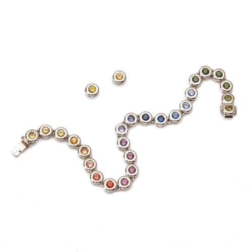 A multi-coloured sapphire bracelet and earrings, the bracelet comprises of twenty-five bezel set multi-coloured sapphires of estimated total weight 3.44 carats. Earrings feature two bezel set round cut yellow sapphires of estimated total weight 0.26 carat