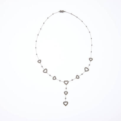 A diamond heart's necklace, one hundred and thirty-two grain set round brilliant cut diamonds of estimated total weight 1.82 carats in open heart motifs. 18ct white gold. Weight 12.1 grams. Length 46cm. Gemologist's report available.