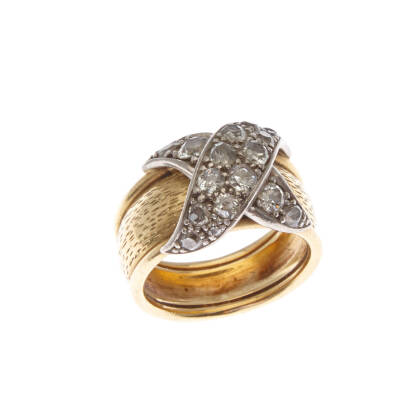 A diamond dress ring, seventeen bead set old mine and early European cut diamonds of estimated total weight 1.65 carats in cross style motif. 18ct yellow and white gold. Weight 13.6 grams. Ring size N1/2. Gemologist's report available.