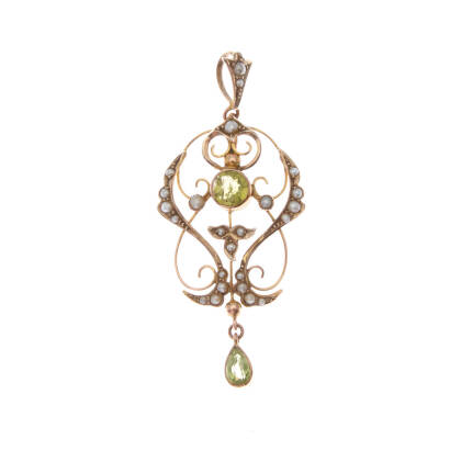 An Edwardian peridot and seed pearl pendant, bezel set round cut peridot centre, accented with twenty-four seed pearls and one pear cut peridot in ornate setting. 9ct yellow gold. Weight 2.6 grams. Pendant length 5cm.
