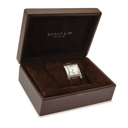 A Gentleman's stainless steel No. 7 wristwatch, Bedat & Co. Automatic. 44x34mm. Ref: 787. Cal. 2004-1. Case numbered 0013. Dual time. Silver guilloche dial with black Arabic numerals. Dial, case and buckle signed. Original leather strap. Box and jewellers