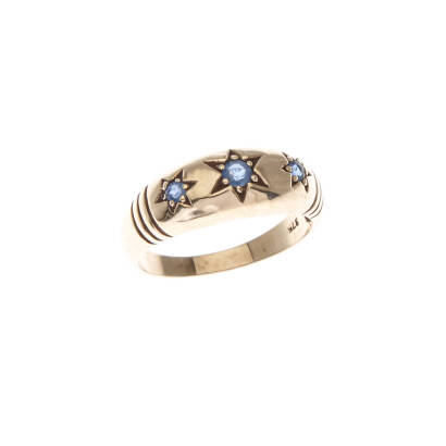 A sapphire dome ring, three graduated gypsy set sapphires. 9ct yellow gold. Weight 3.5 grams. Ring size N1/2.