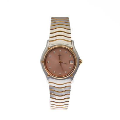 A Lady's stainless steel and gold Wave wristwatch, Ebel, circa 2000. Quartz. 26mm. Ref: 1087123. Serial number 52628801. Pink dial with diamond markers. Date aperture at 3 o'clock. 18ct gold bezel. Case, dial and bracelet signed.