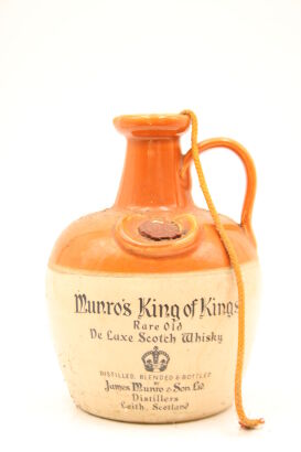 (1) Munro's King of Kings Ceramic Decanter Blended Scotch Whisky, 40% ABV, 700ml, circa 1980s