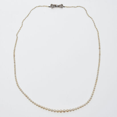 Pearl Necklace with Diamond Bow Clasp