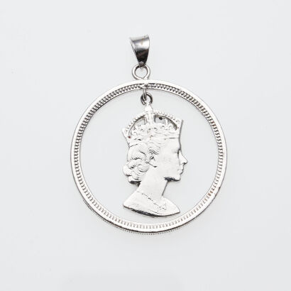 1972 Carved Coin Pendant
