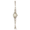 A Lady's gold and diamond cocktail wristwatch, Cyma, circa 1960's. Manual. 17mm. Circular case, silvered dial with applied baton numerals. Diamond set bezel, lugs and 9ct white gold bracelet. 18ct white gold and platinum. Weight 19.7 grams. Gemologist's r