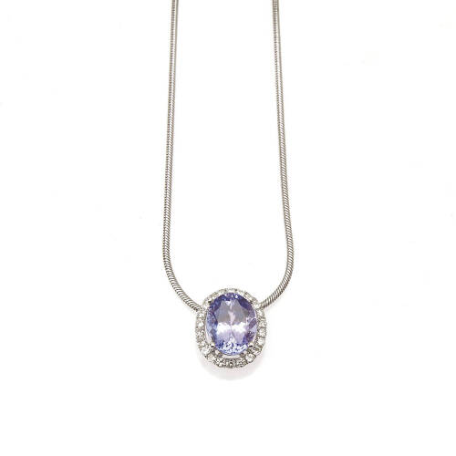 A Tanzanite and diamond pendant on chain, claw set oval tanzanite of estimated weight 2.57 carat, surrounded by small round brilliant cut diamonds of estimated total weight 0.30 carats, hung on a snake-link chain. 14ct white gold. Weight 6.6 grams. Length