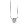 A Tanzanite and diamond pendant on chain, claw set oval tanzanite of estimated weight 2.57 carat, surrounded by small round brilliant cut diamonds of estimated total weight 0.30 carats, hung on a snake-link chain. 14ct white gold. Weight 6.6 grams. Length
