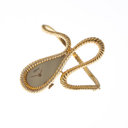 A lady's gold bangle wristwatch, Delaneau. Manual. 40x20mm. Case numbered E220. Gold dial. Twisted rope style bracelet, 58mm width. 18ct yellow gold. Dial signed. Total weight 63.2 grams.