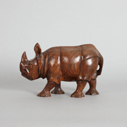A Chinese Wood Carved Rhinoceros Ornament