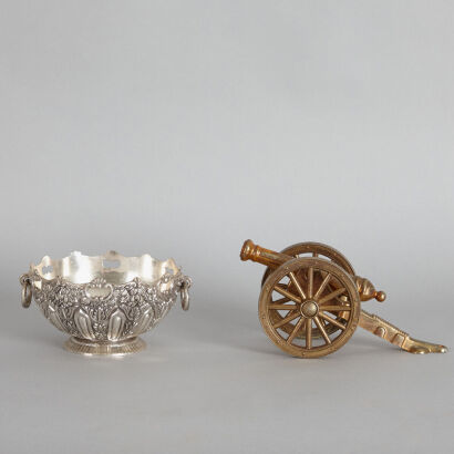 A Brass Cannon Ornament and a Silver Bowl