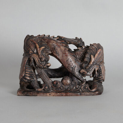A Chinese Dark Jade 'Dragon' Carving