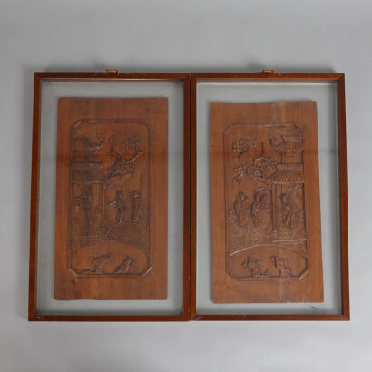 A Pair of Framed Wood Carved Panels