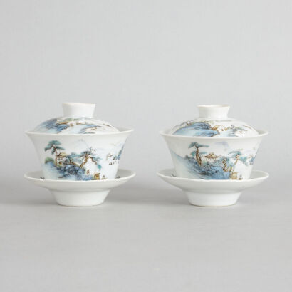 A Pair of Early 20th Century Famille Rose Lidded Tea Cup and Saucer Sets