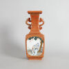 A Chinese Early Republic Period Famille Rose and Iron Red 'Figural' Square Vase with dragon handles (Da Qing Qianlong Nian Zhi Mark)